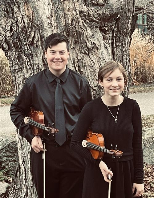 Violinists Clover Heinzmann and Seth Rochford
