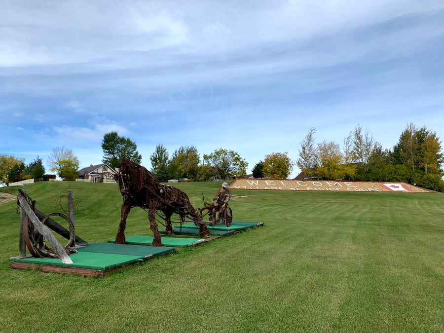 Pouce Coupe Sculpture & Welcome Sign BC